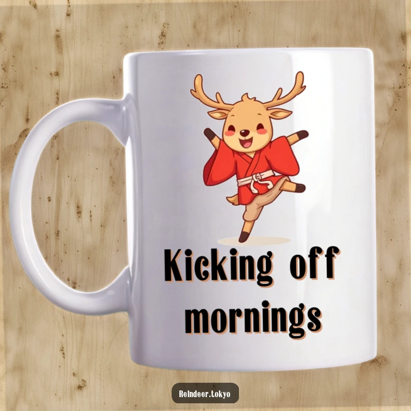 Funny reindeer kimono mug with a cute cartoon reindeer in a red kimono gleefully performing a high kick with festive joy.