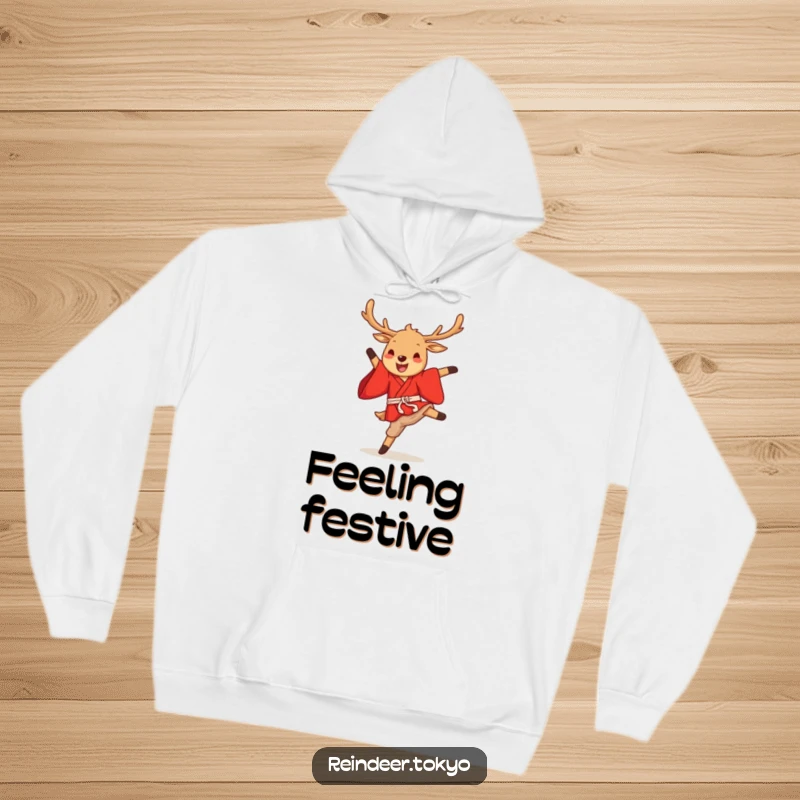 Funny reindeer kimono hoodie with a cute cartoon reindeer in a red kimono performing an energetic and gleeful high kick.
