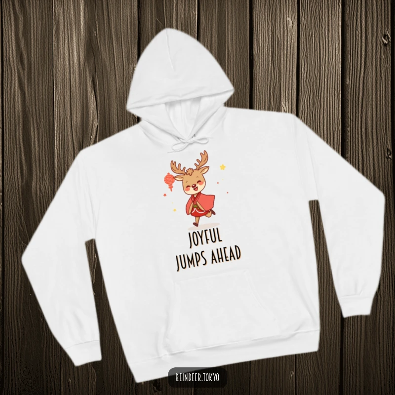 Funny hoodie displaying a gleeful reindeer in a red and white kimono, energetically skipping along, a cozy and humorous winter wear.
