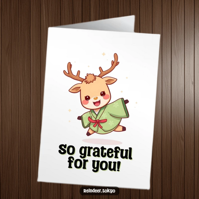Funny Free Printable Reindeer Thank You Card: Cheerful reindeer in a green kimono spinning happily.